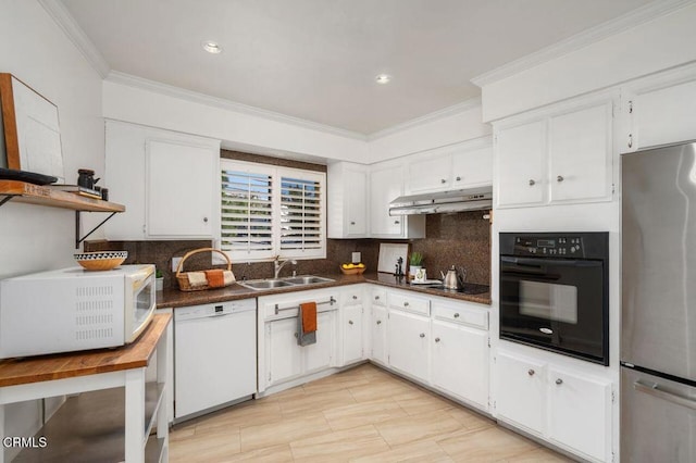 kitchen with ornamental molding, sink, white cabinets, and white appliances