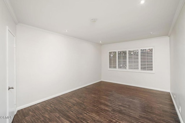 unfurnished room featuring crown molding and dark hardwood / wood-style flooring