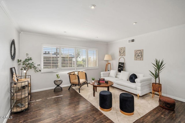 living room featuring light hardwood / wood-style flooring and ornamental molding