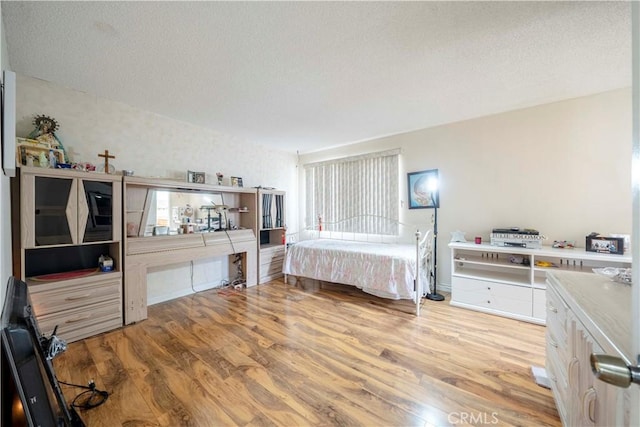 bedroom featuring light hardwood / wood-style flooring