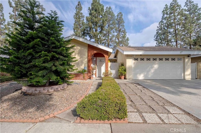 single story home featuring a garage