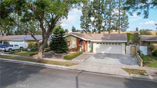 single story home featuring a garage