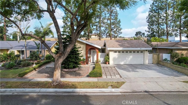 ranch-style house featuring a garage