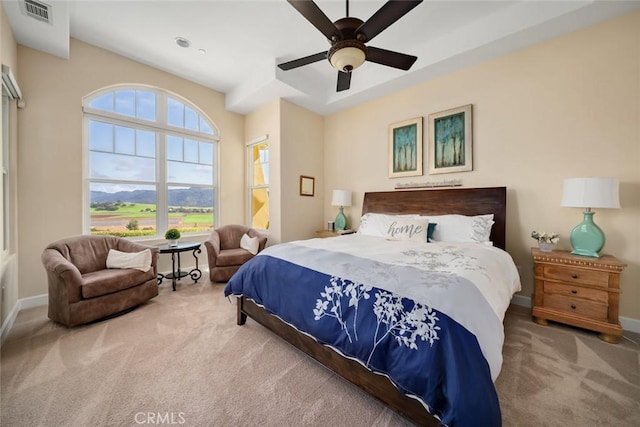 bedroom with ceiling fan and carpet flooring