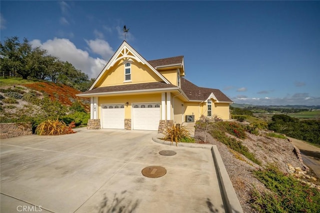 view of front of property featuring a garage