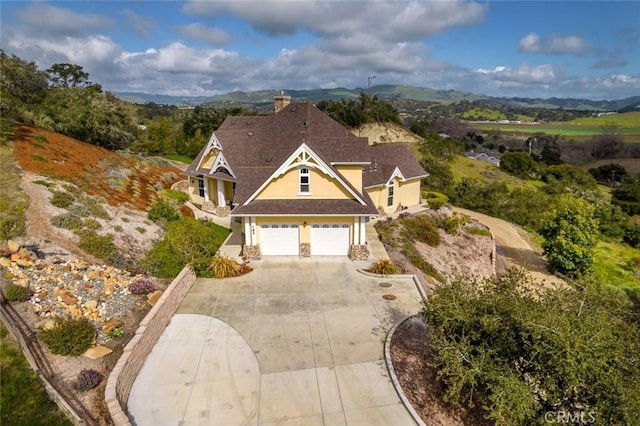 drone / aerial view with a mountain view