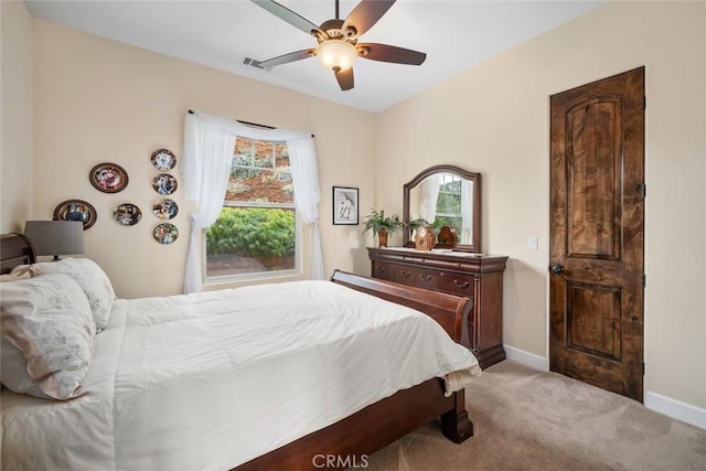 bedroom featuring ceiling fan and carpet floors