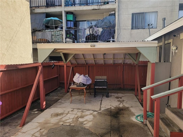 view of patio featuring area for grilling and a fenced backyard