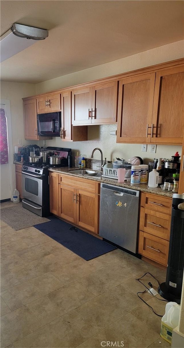 kitchen featuring sink and appliances with stainless steel finishes