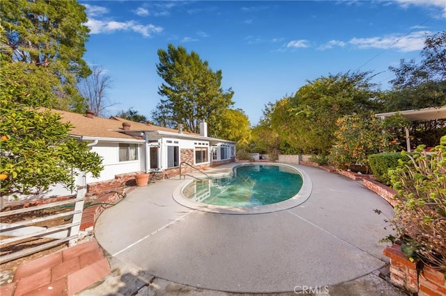 view of pool with a patio