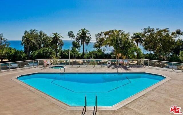 view of pool featuring a patio area