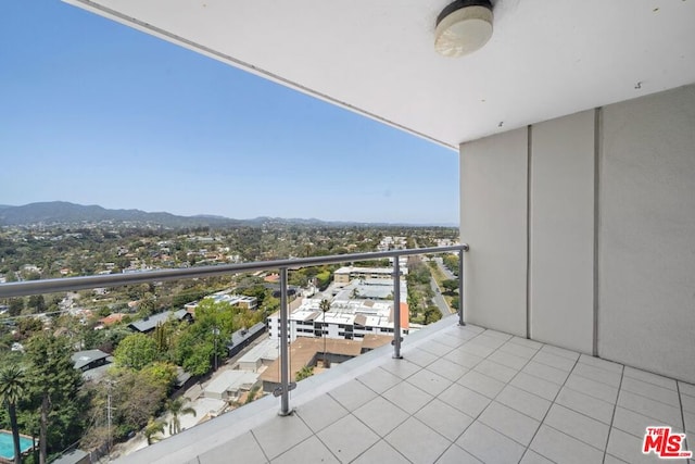 balcony featuring a mountain view