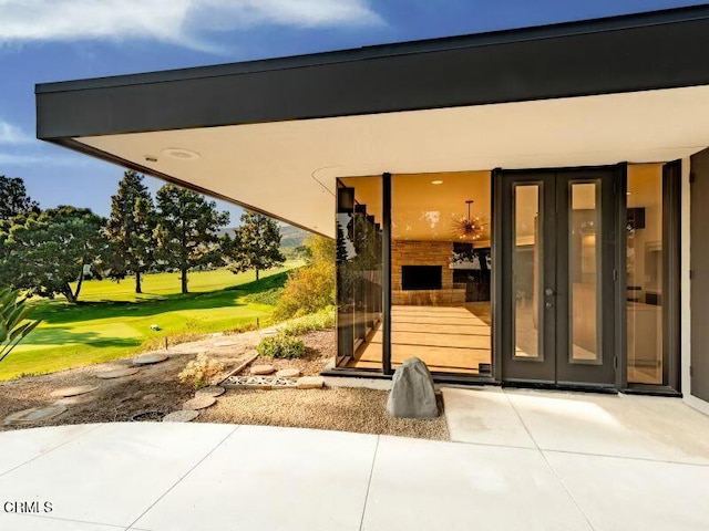 property entrance with french doors and a patio area