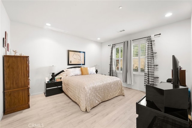 bedroom featuring light wood-type flooring