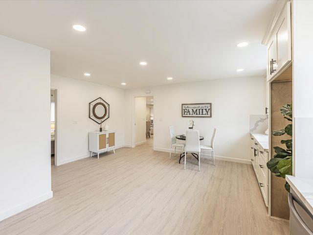 dining area with light hardwood / wood-style flooring