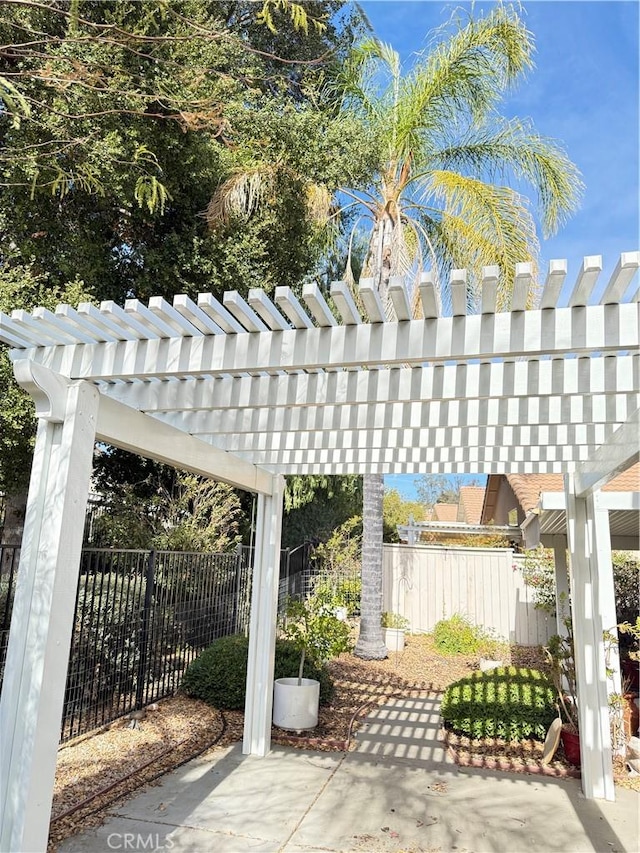 view of patio featuring a pergola