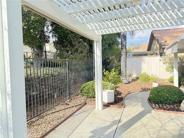 view of patio featuring a pergola