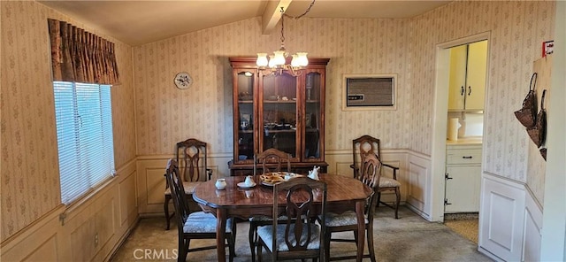 dining space featuring light colored carpet, a notable chandelier, and vaulted ceiling with beams