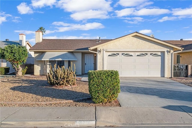 single story home featuring a garage