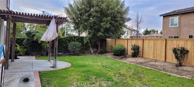 view of yard featuring a pergola and a patio