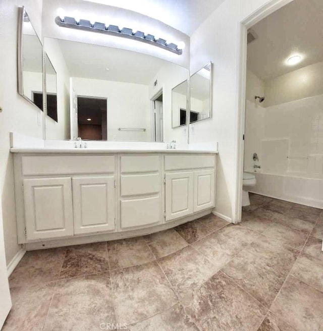 full bathroom with vanity, toilet, and shower / bath combination