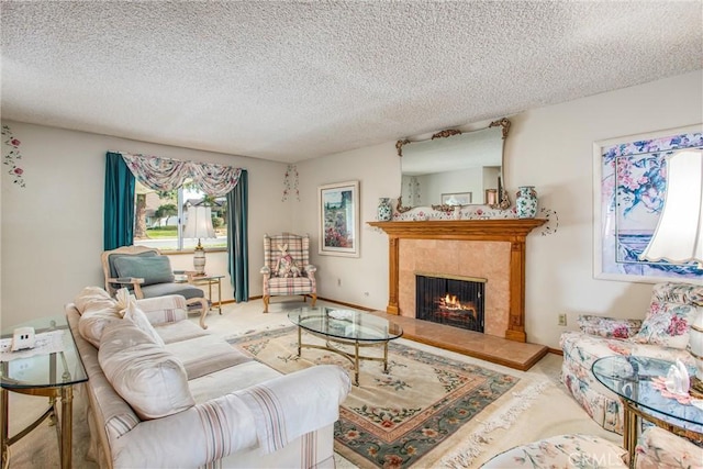 carpeted living room with a tile fireplace and a textured ceiling