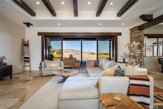 living room featuring beam ceiling