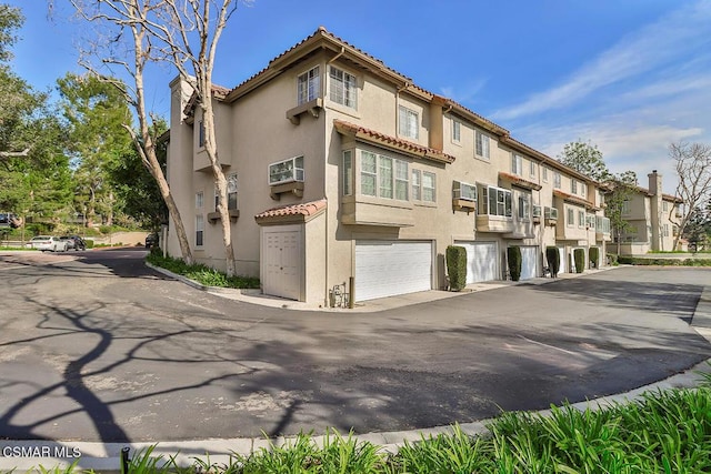 view of property featuring a garage