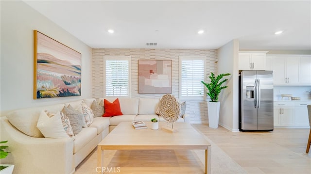 living room featuring light wood-type flooring