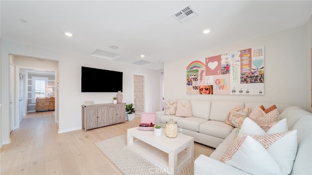 living room featuring light hardwood / wood-style floors