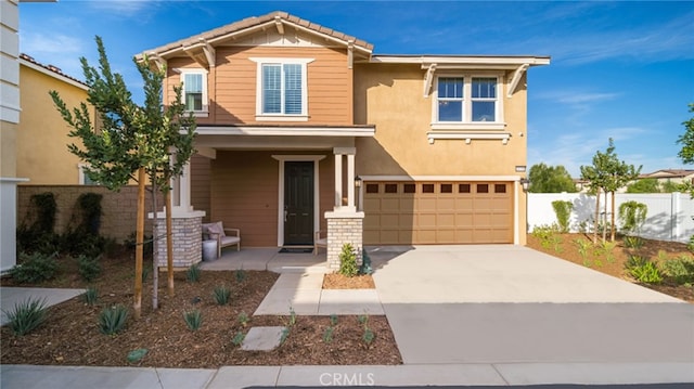 view of front of home with a garage