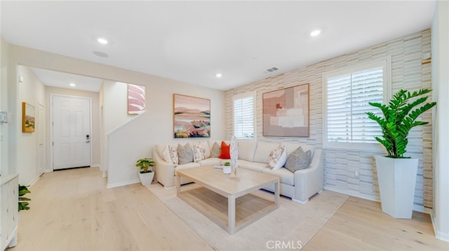 living room featuring light wood-type flooring