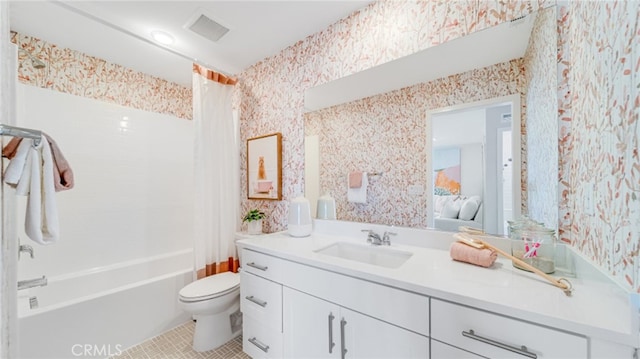 full bathroom with tile patterned flooring, vanity, shower / bath combination with curtain, and toilet