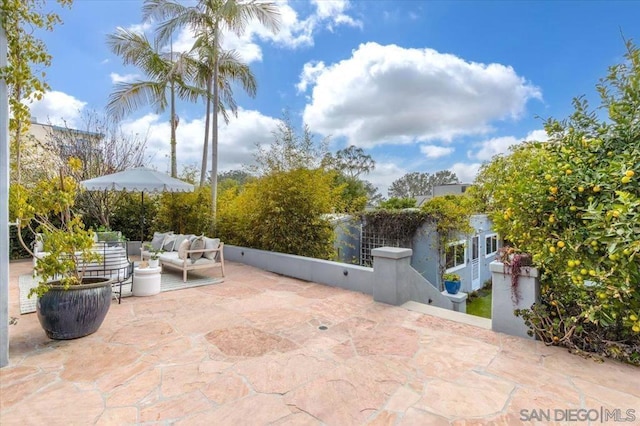 view of patio with an outdoor living space