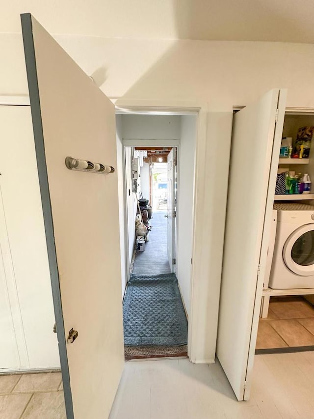 hallway with washer / clothes dryer