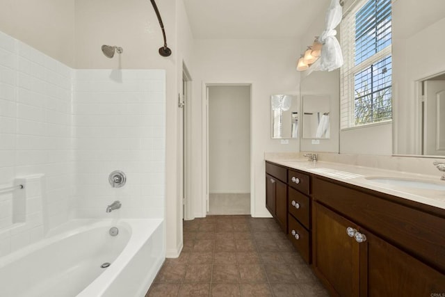 bathroom with vanity, tub / shower combination, and tile patterned floors