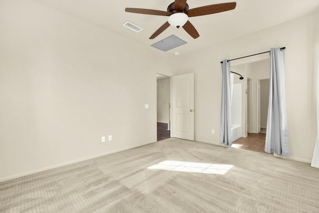 unfurnished bedroom featuring ceiling fan and light carpet