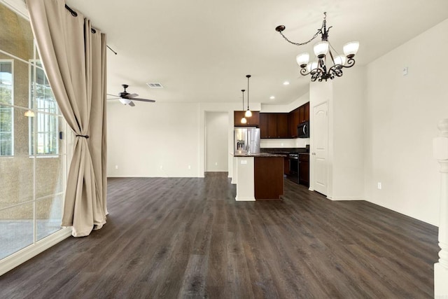 kitchen featuring dark wood-type flooring, a center island, stainless steel fridge with ice dispenser, dark brown cabinets, and stove