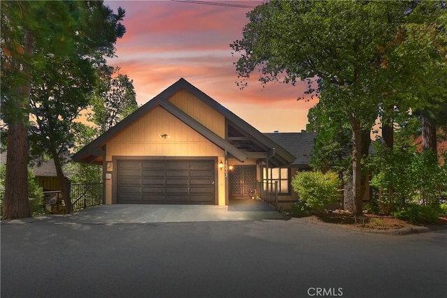 view of front of property featuring a garage