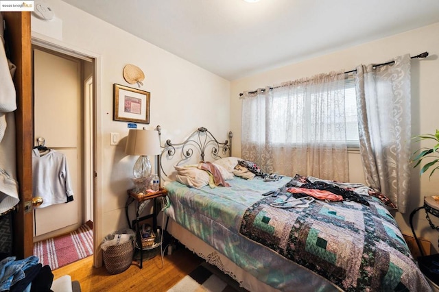 bedroom featuring hardwood / wood-style flooring