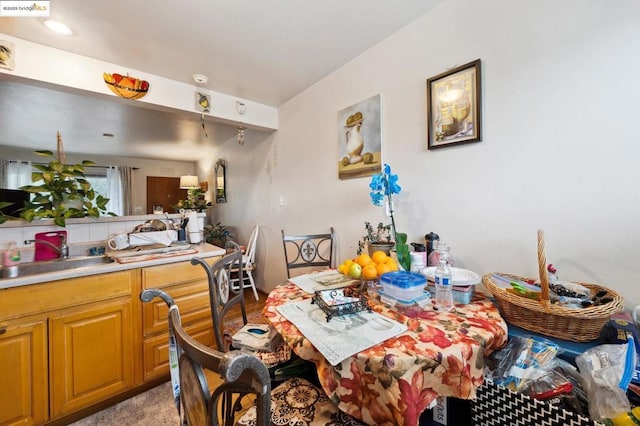 dining space featuring sink