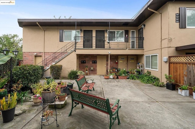 rear view of property with a patio