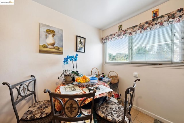 dining room with light tile patterned floors