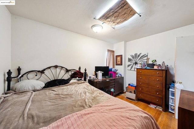 bedroom featuring light hardwood / wood-style flooring