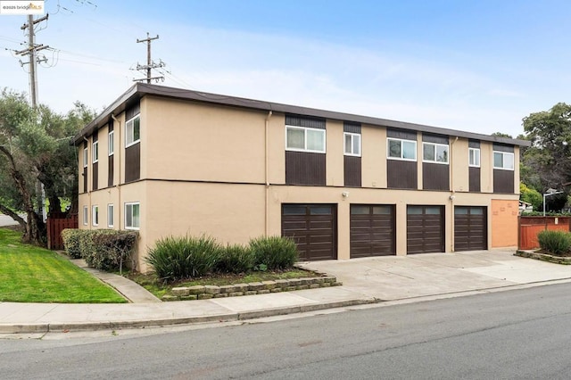 exterior space with a garage