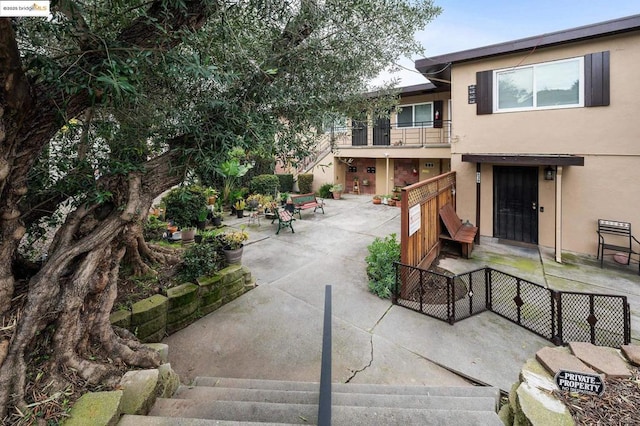 view of front of home with a patio area