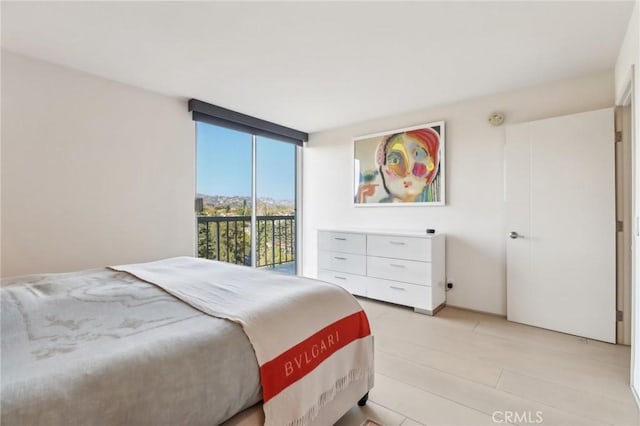 bedroom with a wall of windows