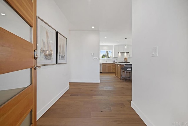 hall featuring wood-type flooring