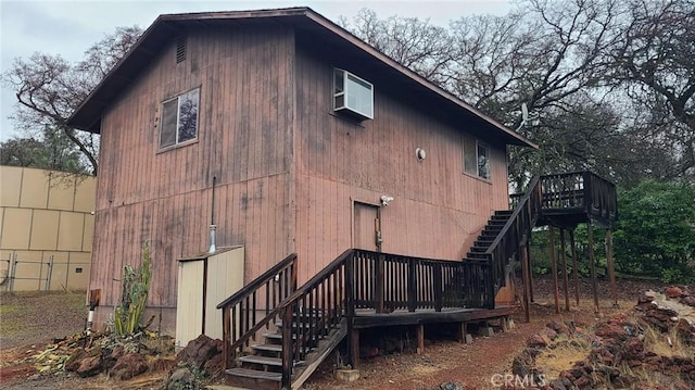 view of property exterior featuring a deck