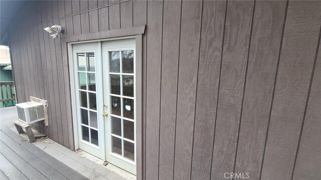 details featuring cooling unit and french doors